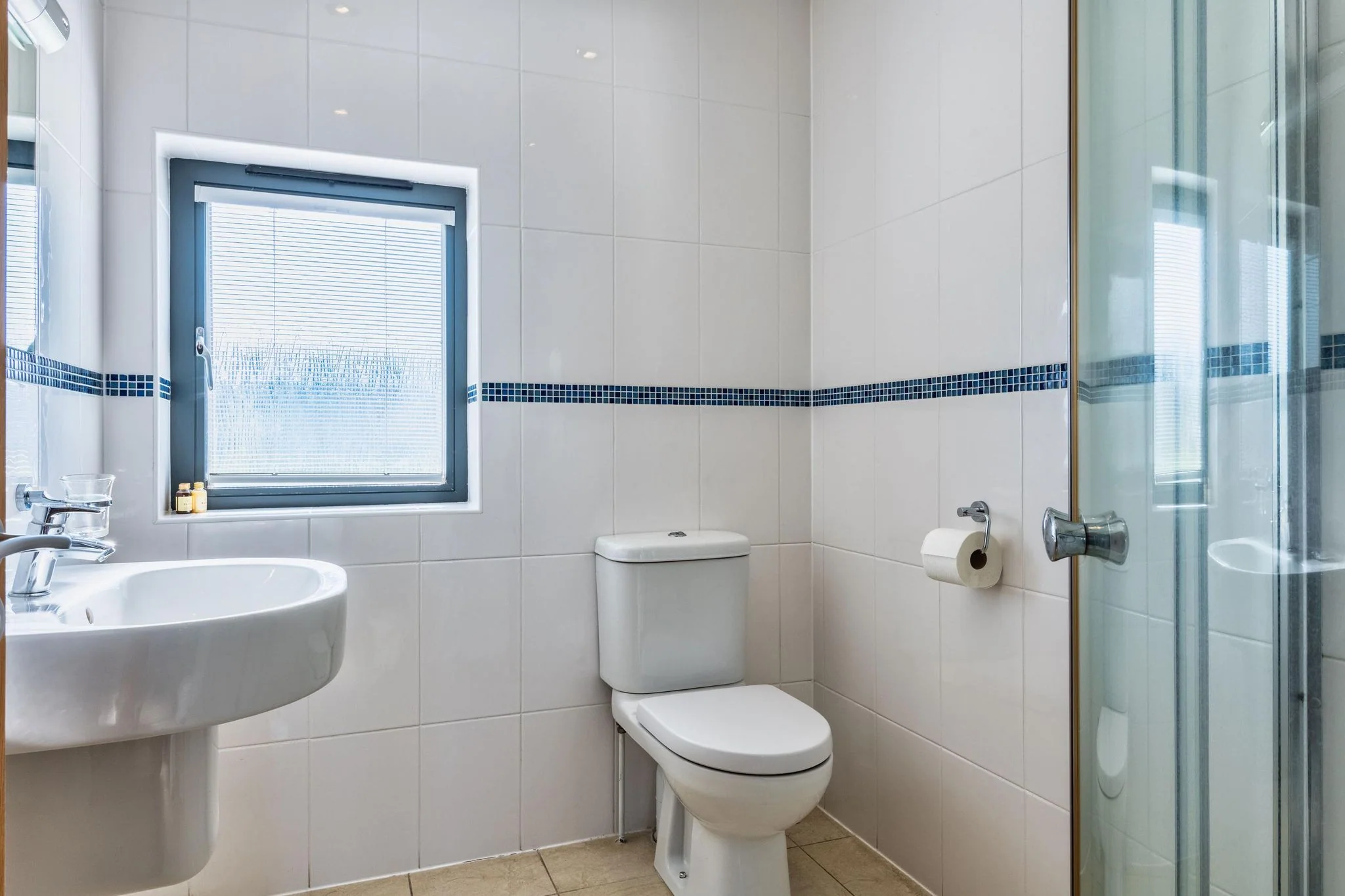 Arundell bathroom with a pedestal basin and WC
