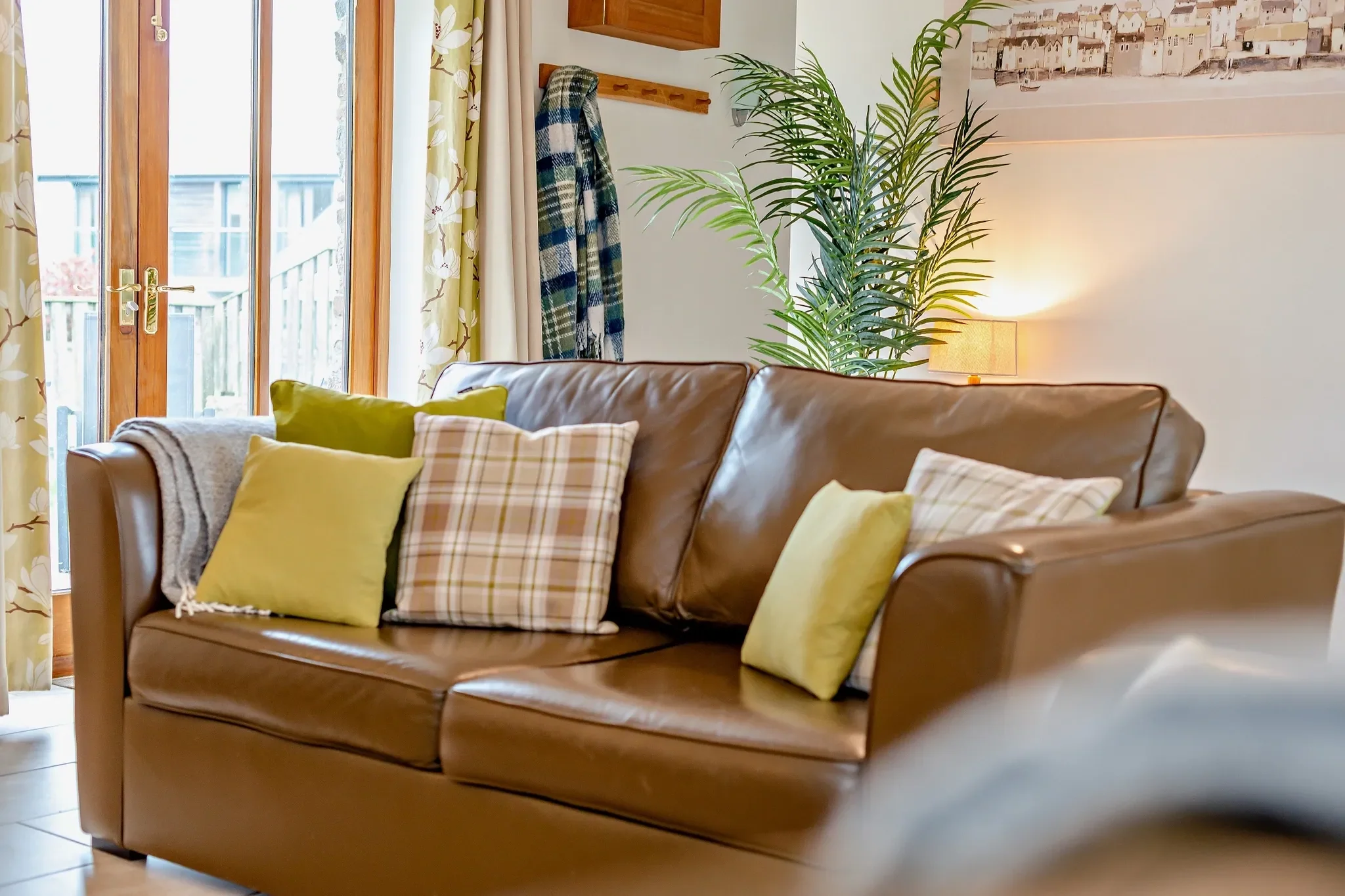 Barley Park — vaulted lounge with leather sofas and wood burner, Whalesborough Farm Resort