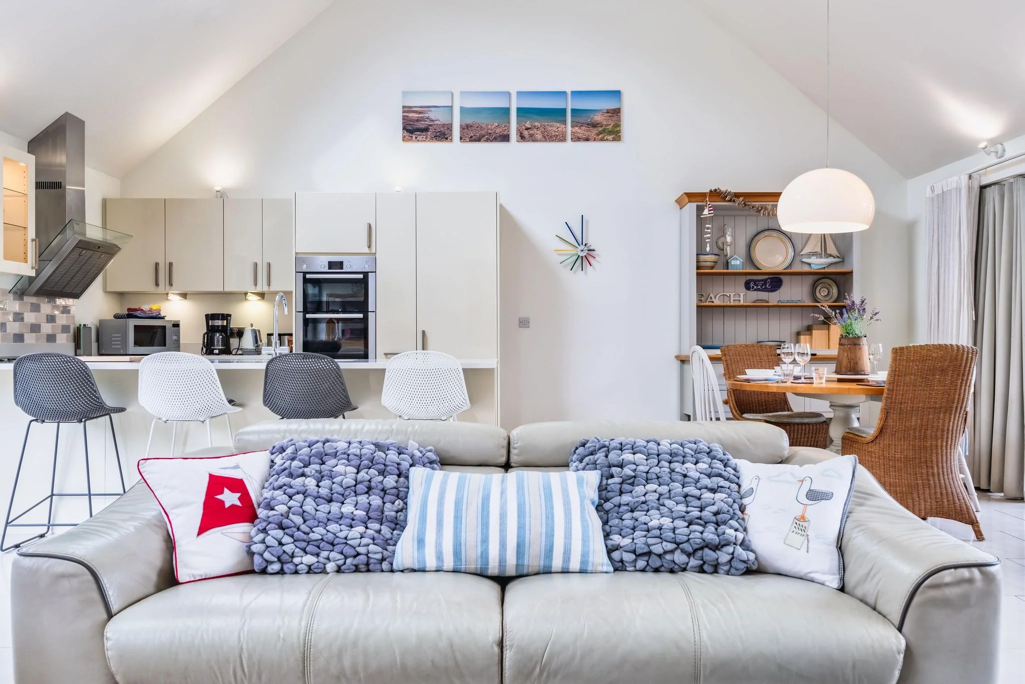 Beachcombers kitchen and dining area seen across the open-plan living space