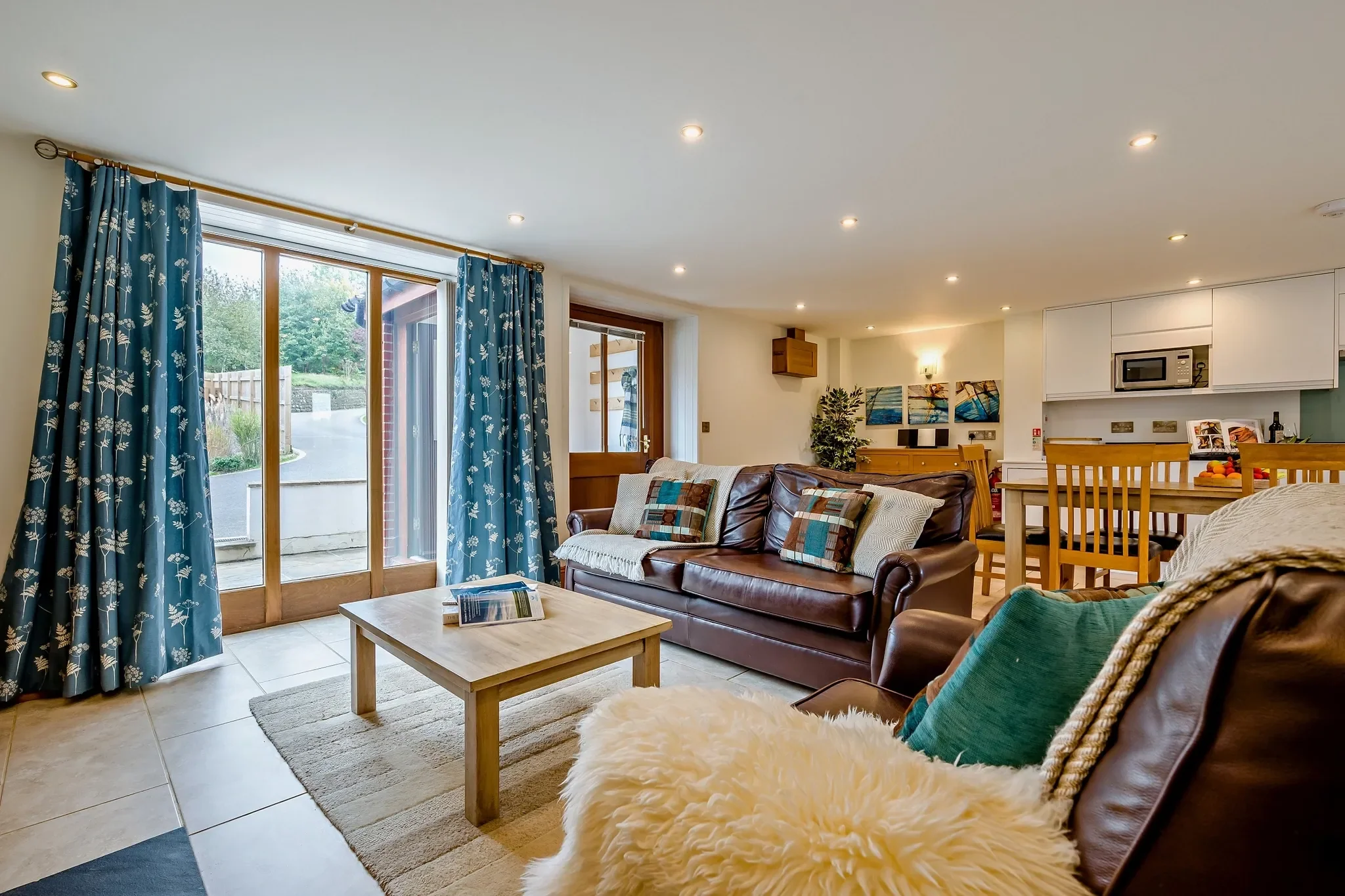 The open-plan triple-aspect kitchen, living and dining room at Sand Parks