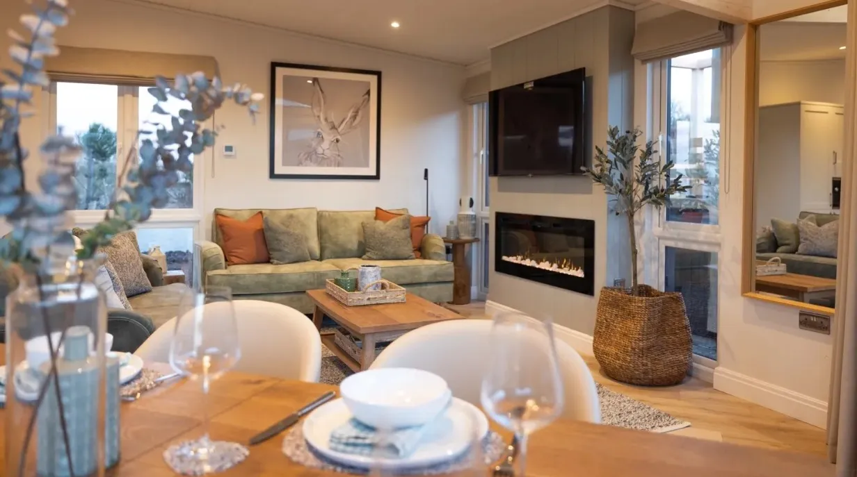 Inside a Trelowen lodge at Whalesborough &mdash; open-plan living and dining