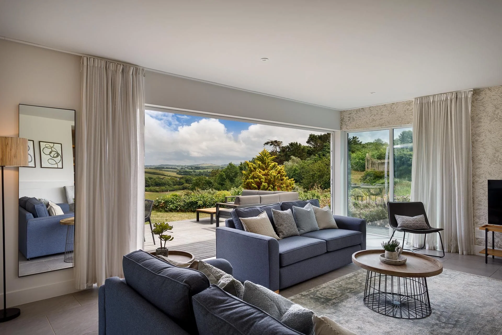 Whalesborough Cottage private hot tub set in the enclosed garden with estate views
